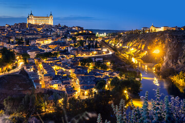 Panoramic view of illuminated Toledo at night, Spain