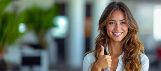 Deurstickers Latina woman girl giving a thumbs up against a creamy gradient background, isolated against a light color backdrop, hand gesture, smiling, sales consultant, sales concept © photowarehouse
