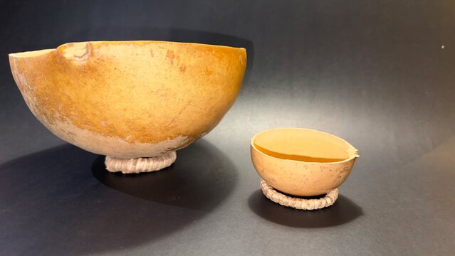 close-up of a typical container made from the fruit of the tecomate or morro tree.  black background with copy space