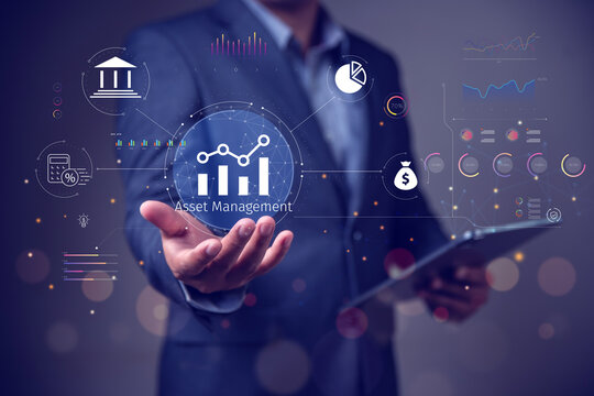Asset management concept, Businessman Holding asset management and Icon  on virtual display. Financial Property Digital assets.