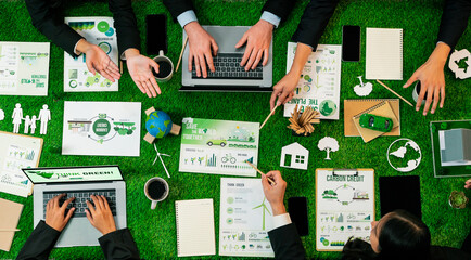 Panorama top view of business people planning business marketing with environmental responsibility for greener ecology. Productive teamwork contribute nature preservation and sustainable future.Quaint