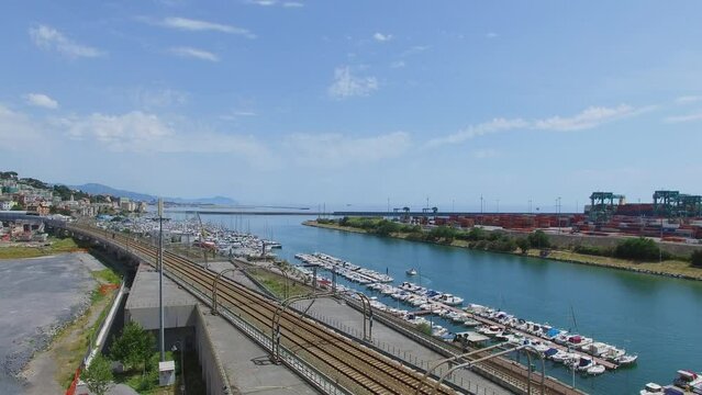Railway near Tourist landing Marina Castelluccio and port Voltri Terminal Europa
