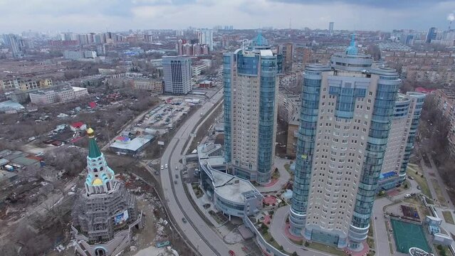 Cityscape with transport traffic near church and Ladya monument