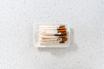 Candy cane chocolate covered pretzel rods