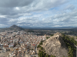 Aerial view of Medieval Castle of San Juan and the town of Calasparra in Murcia Spain with old quarter wrapped around the foot of the hill