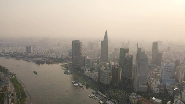 4k Aerial drone footage - Beautiful skyline of Saigon (Ho Chi Minh City) at sunset. Vietnam, Asia