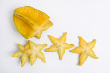 Fototapeta premium Star fruits, Averrhoa carambola, is a plant that produces distinctively shaped fruit originating from Indonesia, India and Sri Lanka, photos from several views