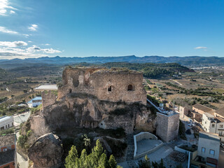 Fototapeta premium Aerial view of Castellnovo castle, medieval hilltop ruins near Segorbe Spain with rectangular tower