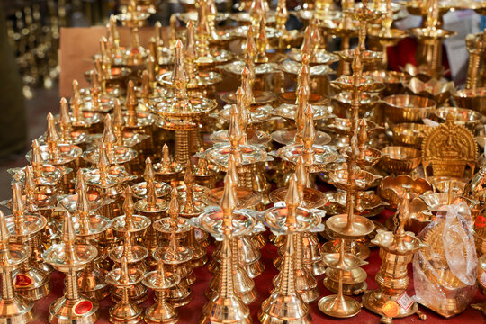 Indian traditional samai or samayee diya brass lamp. Hindu puja stuff or puja thali many lamp near temple for yoga worship 