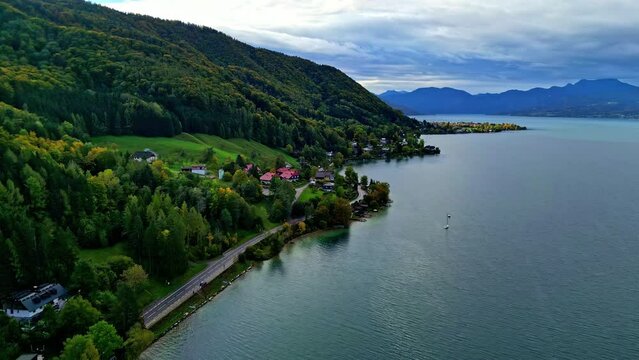 Aerial Natural lake location green hills and waterside Road mountainous blue sky