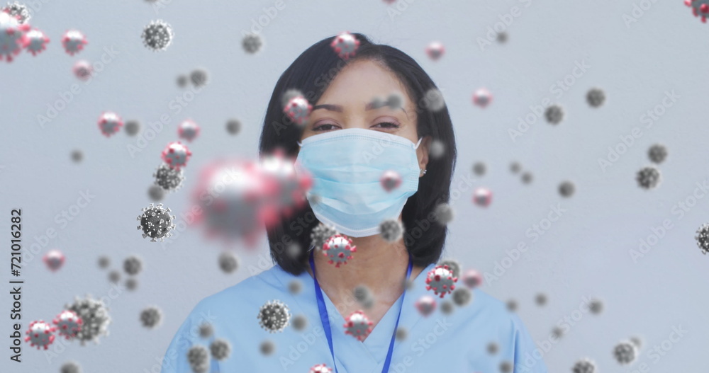 Sticker Image of floating covid-19 cells with female doctor wearing face masks