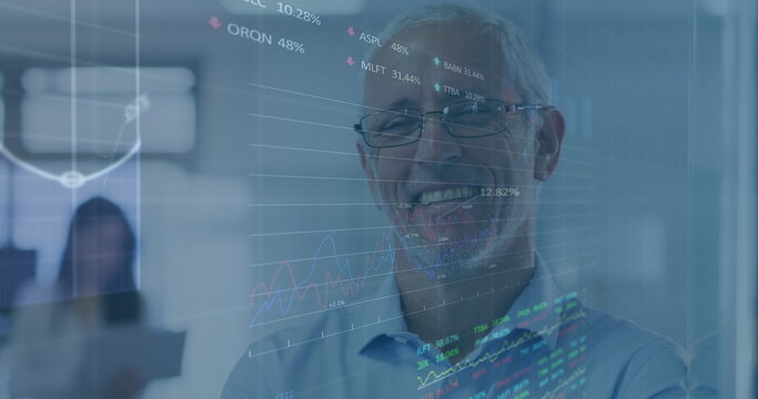 Image of digital interface showing statistics with diverse colleagues working together in an office