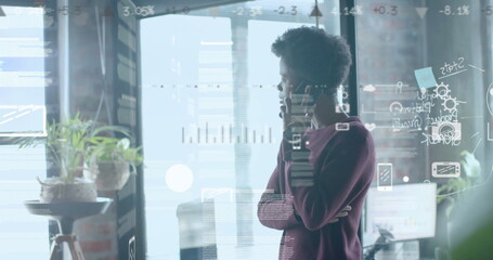 Image of data processing over african american businessman in office