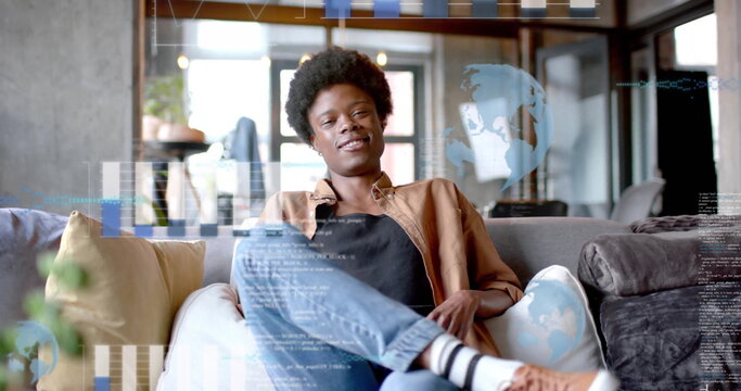 Image of data processing over african american businessman in office