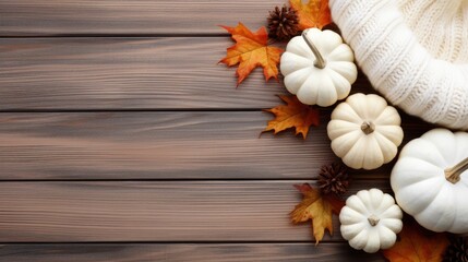 Autumn leaves, white pumpkins and hat on wooden background. Top view with copy space Generative AI