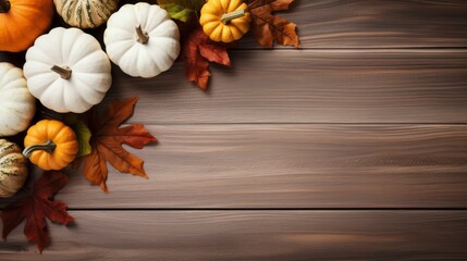 Autumn leaves and pumpkins on wooden background with copy space, top view Generative AI