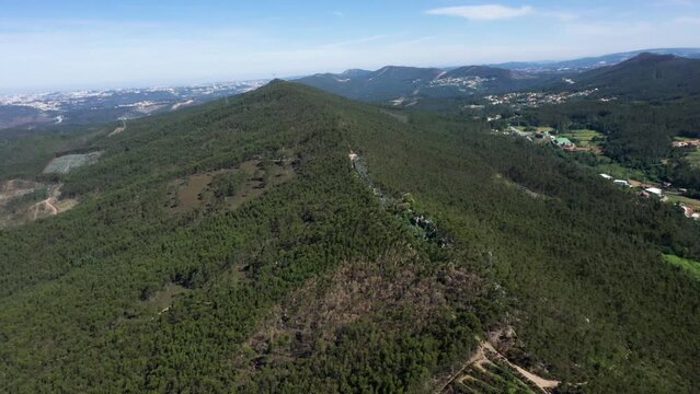 Panoramic aerial establishing ridgeline forest of Gondomar Portugal
