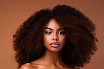 Radiant Beauty: Stunning Woman with Voluminous Afro Hair on Warm Toned Background