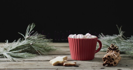 A cozy hot chocolate mug surrounded by festive decor