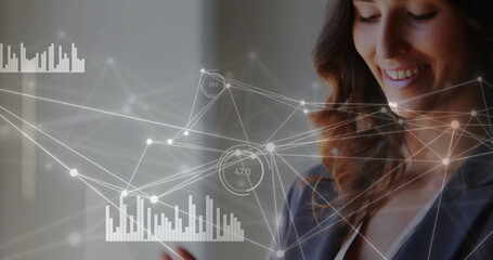 Image of network of connections over caucasian businesswoman using tablet