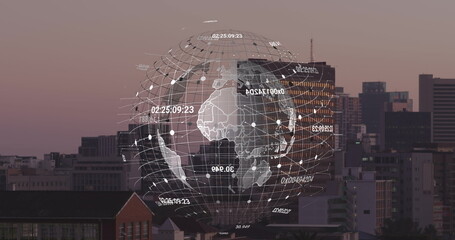 Image of globes over cityscape