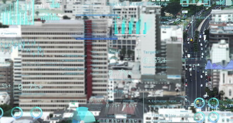 Image of financial data processing over cityscape