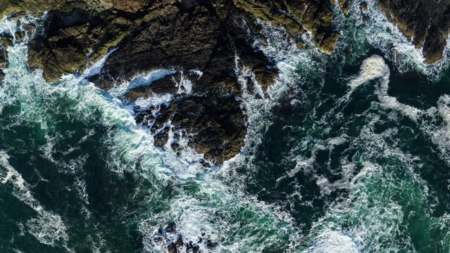 Drone video at sunset in Ucluelet British Columbia, Canada over the ocean and forest
