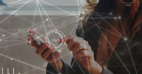 Image of network of connections over caucasian businesswoman using smartphone