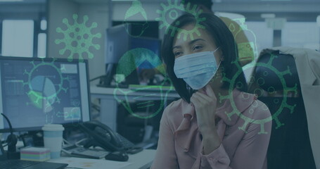 Image of pandemic icons with woman in office wearing face masks