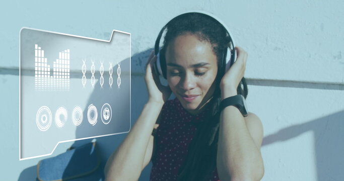 Image of data processing over woman exercising with headphones on - Powered by Adobe