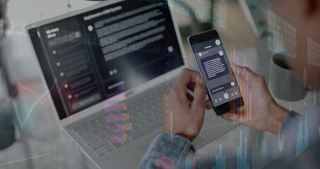 Image of data processing over biracial businessman with smartphone and laptop in office