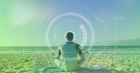 Image of scope scanning over african american man meditating at beach