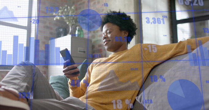Image of data processing over african american businessman in office - Powered by Adobe