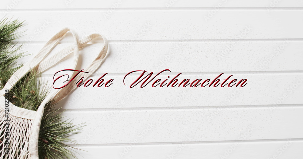 Canvas Prints frohe weihnachten text in red over shopping bag with christmas bracnhes on white wood background