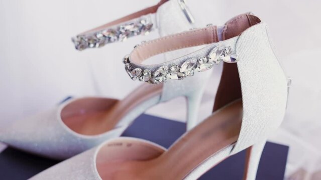 Side view of wedding high heels of the bride