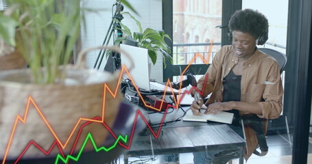 Image of data processing over african american businessman in office