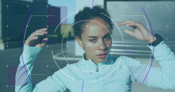 Image of statistics and graphs over woman exercising on promenade by the sea