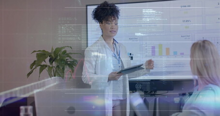 Image of data processing over biracial female doctor in office