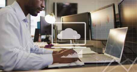 Image of data processing over african american businessman using computer in office