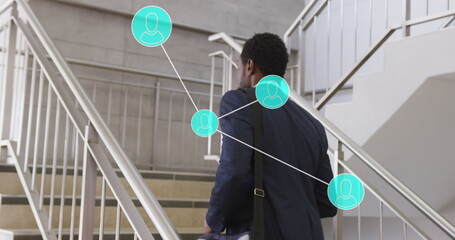 Image of connections with data processing over african american businessman in office