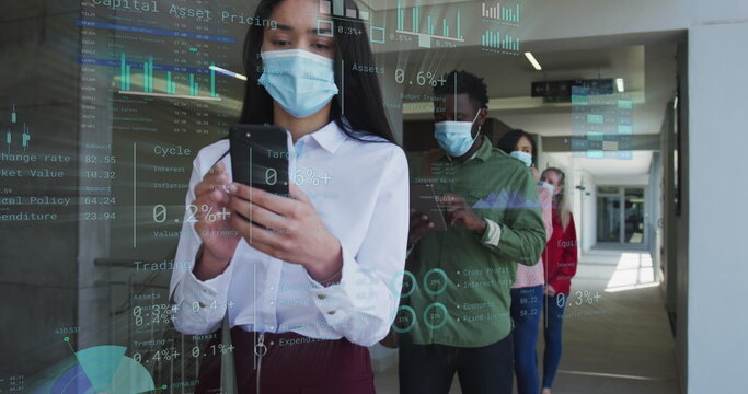 Image of financial data over diverse business people in face masks queueing in corridor