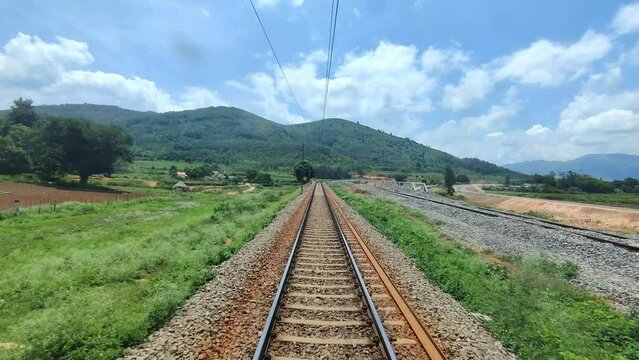 Scenic Train Route in India through Mountain Valley