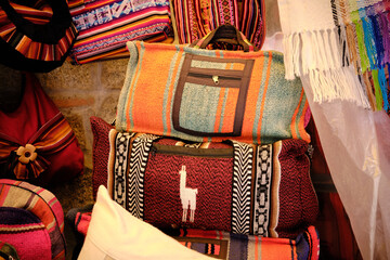 colorful handbags made of indigenous aymara textiles from la paz bolivia - obrazy, fototapety, plakaty