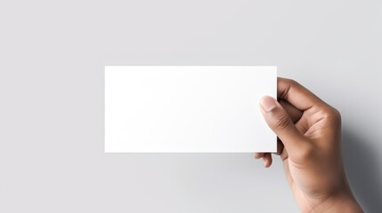 Obraz premium Hands holding business card mockup in white background