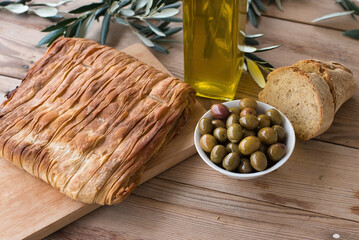 olive oil, extra virgin olive oil in a glass bottle, on a wooden table.