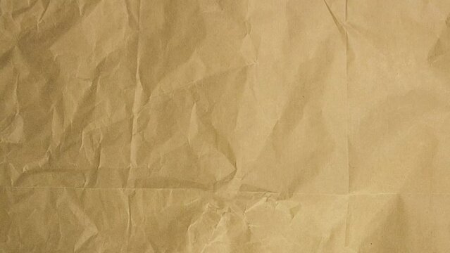 Crumpled Paper Looping Animation. Video background.