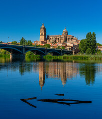 Fototapeta na wymiar Bridge of Sanchez Fabres in Salamanca over Tormes river and Cathedral, Spain 