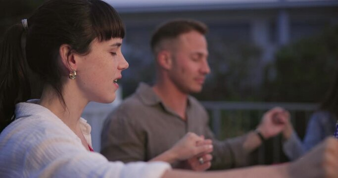 Family dinner, holding hands and woman pray for American holiday event, religion or gratitude to holy spirit. USA, Jesus Christ and people worship God at group supper, Independence Day or 4th of July
