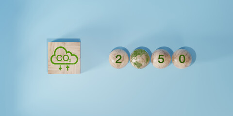 2050 year, Net zero and carbon neutral concept. CO2 reducing icon print screen on wooden and world map for decrease CO2.  Net zero greenhouse gas emissions target.