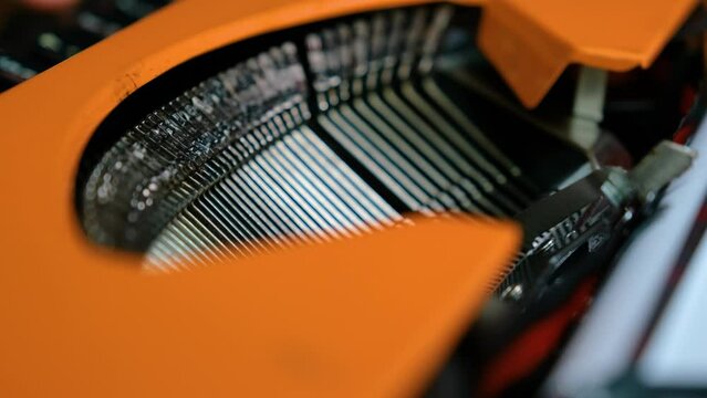 Writing letters with orange retro vintage typewriter